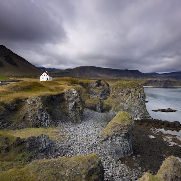 White house in hamlet of Arnastapi on Snaefellsness Peninsula.