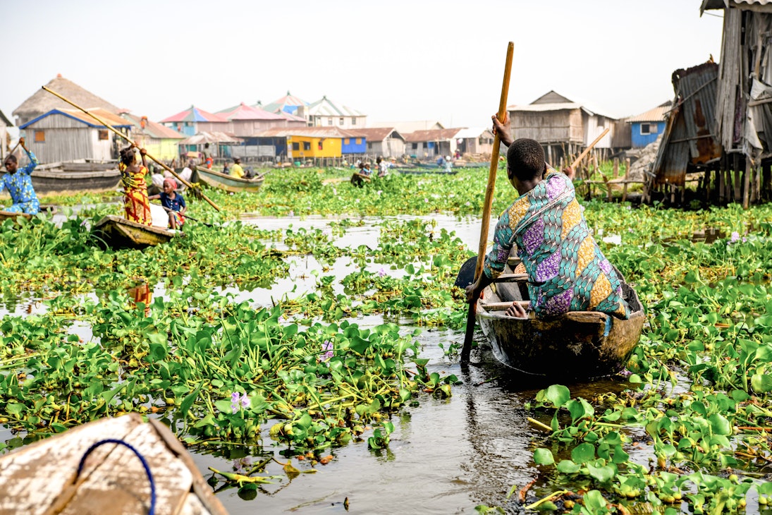 Africa, West Africa, Benin, Lake Nokoue, Ganvié. Pirogues in the water streets of the lakeside town of Ganvié.
1246920424