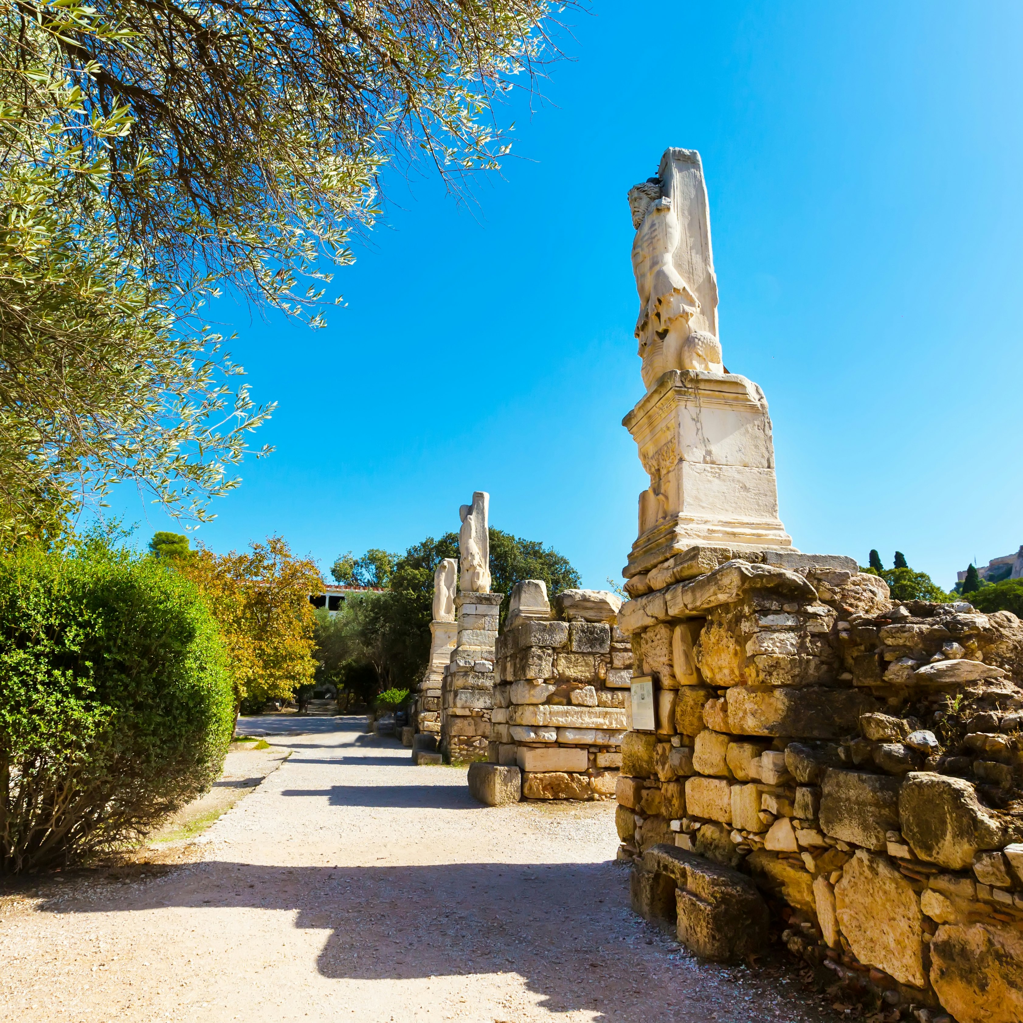 Odeon of Agrippa statues in the Ancient Agora of Athens, Greece
637930866
Triton, Travel, People Traveling, Ancient Civilization, Tourism, Looking At View, Cloudscape, Giant, Antiquities, Mythology, The Ancient Agora, Art, Stone Material, Statue, Sculpture, Archaeology, Speculative Being, Greek Culture, Number, Roman, Classical Greek, Ruined, History, Ancient, Old, Cultures, Famous Place, Architecture, Travel Destinations, Tourist, Roman Forum, Acropolis - Athens, Athens - Greece, Attica - Greece, Greece, Europe, Animal, Marble, Cloud - Sky, Architectural Column, Monument, Old Ruin, Cityscape, agrippa, odeion, God, Odeon Cinemas