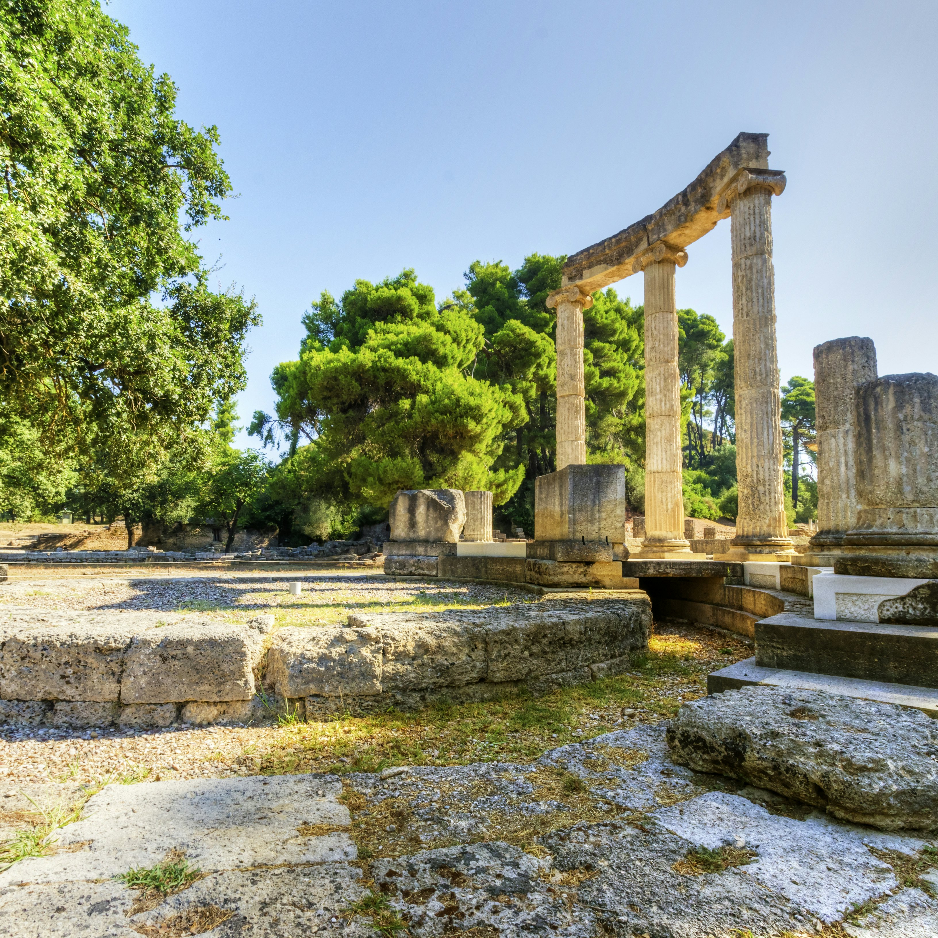 Ruins of the ancient site of Olympia, specifically the Philippeion in the Altis of Olympia, which was an Ionic circular memorial of ivory and gold. The Olympic games originate from there.