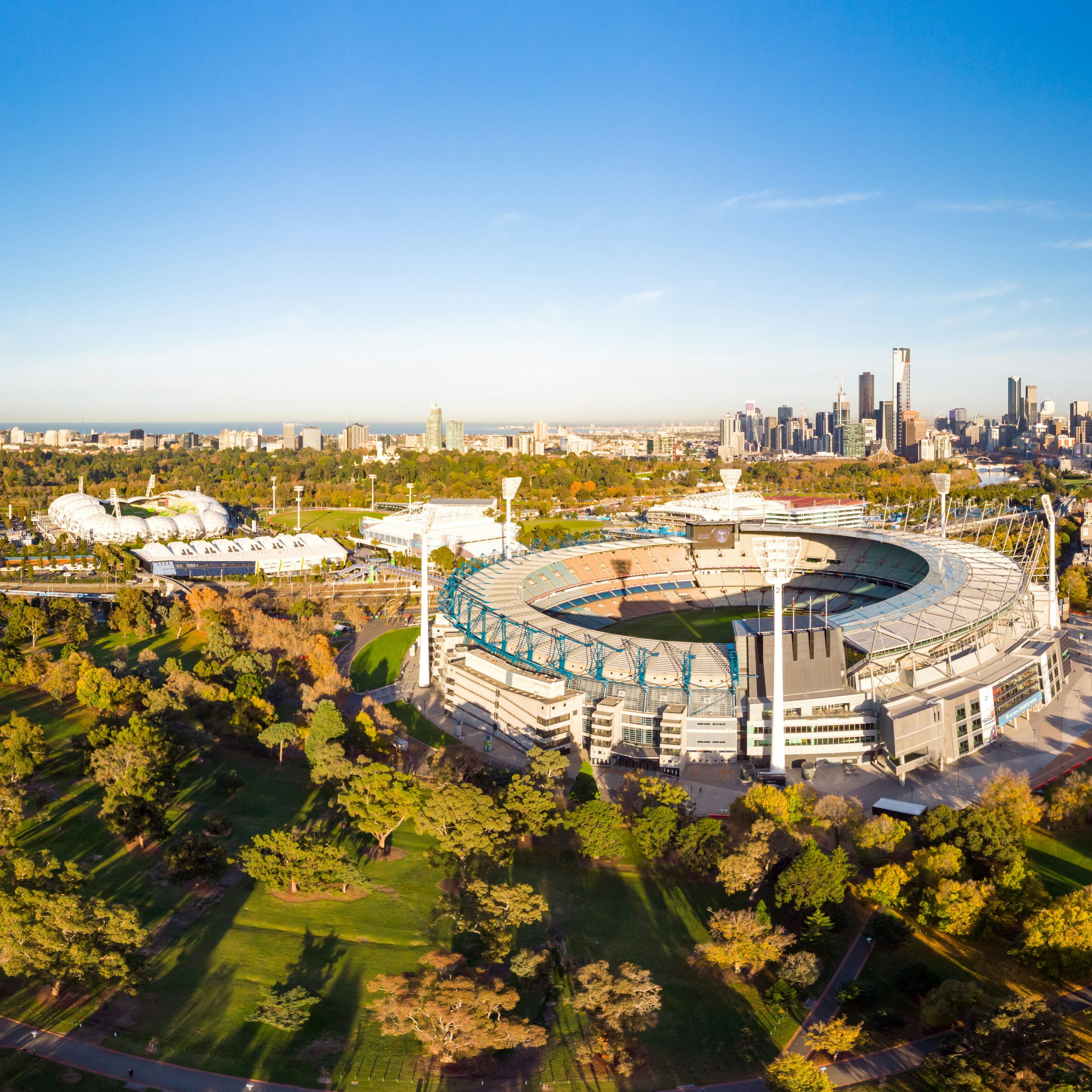 MELBOURNE, AUSTRALIA - MAY 30: Melbourne's famous skyline with Melbourne Cricket Ground stadium in the foreground on a cool autumn morning in Melbourne, Victoria, Australia on May 30th 2018.